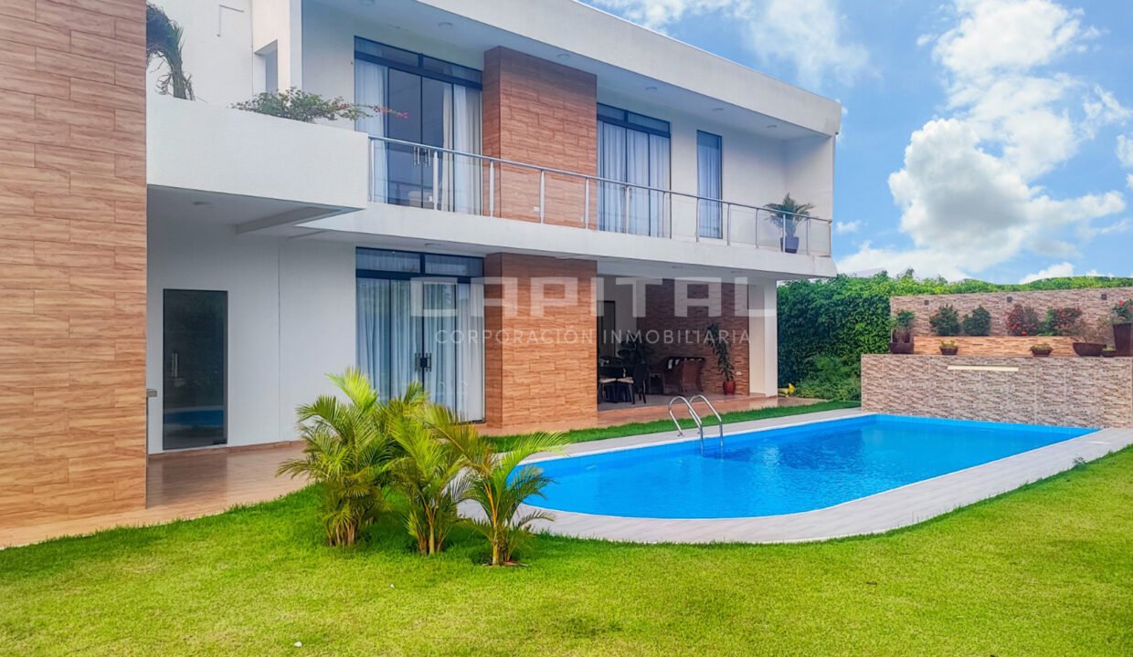 1-venta-casa-condominio-UruboVillage-familias-piscina-5-dormitorios-urubo-santacruz-bolivia